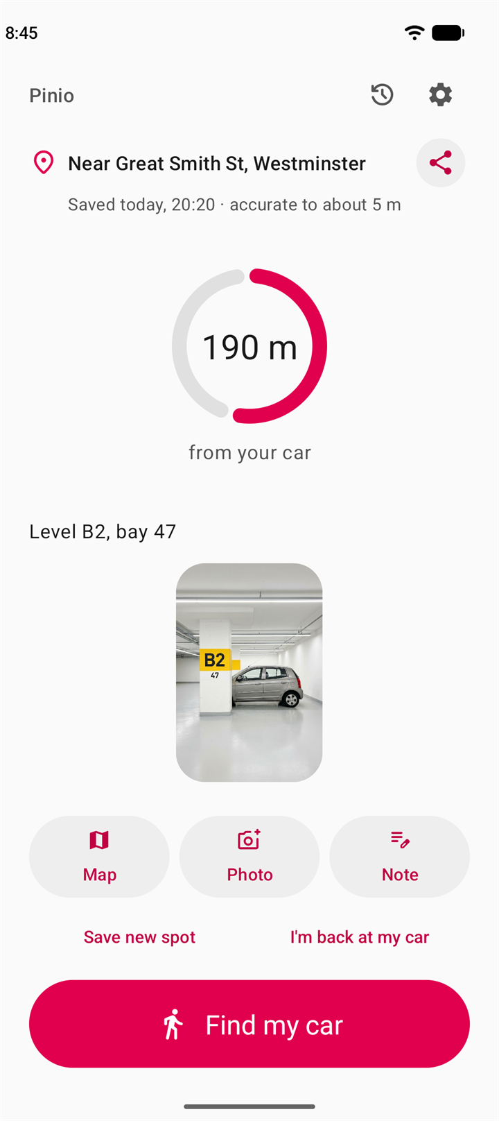 Pinio main screen showing a saved address, a ring reading 190 metres from your car, a note, a photo and the Find my car button